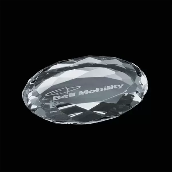 Optical crystal oval paperweight.
