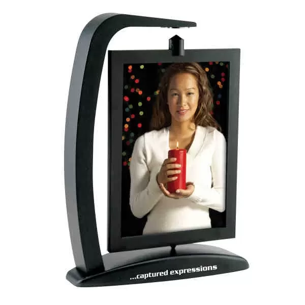 Magnetic spinning photo frame